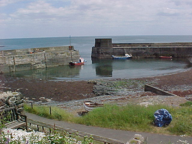 photograph of fishing boats in Craster Harbour